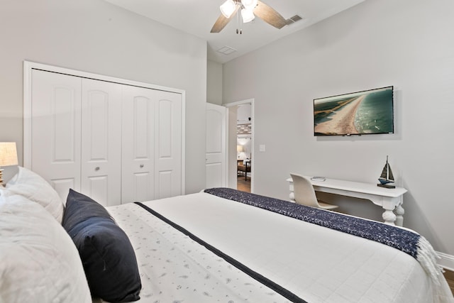 121 Grand Ravine Dr, Saint Augustine, FL 32086 - bedroom with wood finished floors, a closet, a ceiling fan, and baseboards