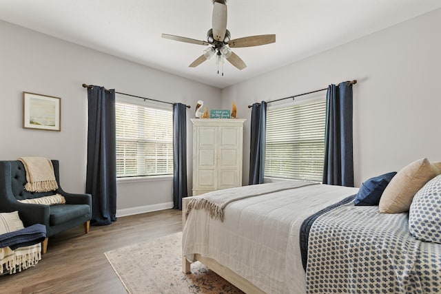 121 Grand Ravine Dr, Saint Augustine, FL 32086 - bedroom with baseboards, wood finished floors, and a ceiling fan