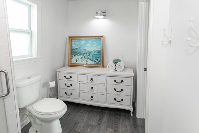 bathroom featuring toilet and hardwood / wood-style floors