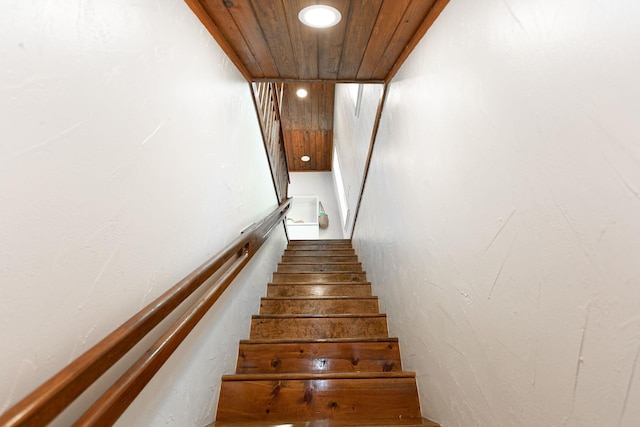 staircase featuring wood ceiling