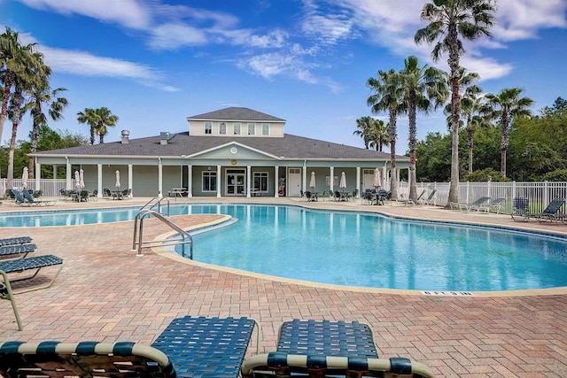 view of swimming pool featuring a patio area