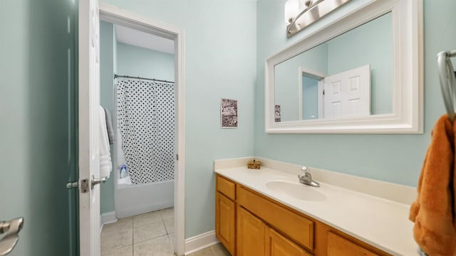 bathroom with tile patterned flooring and vanity