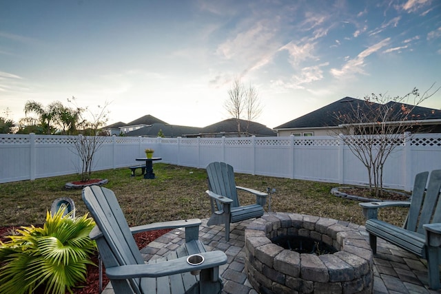 view of patio featuring an outdoor fire pit