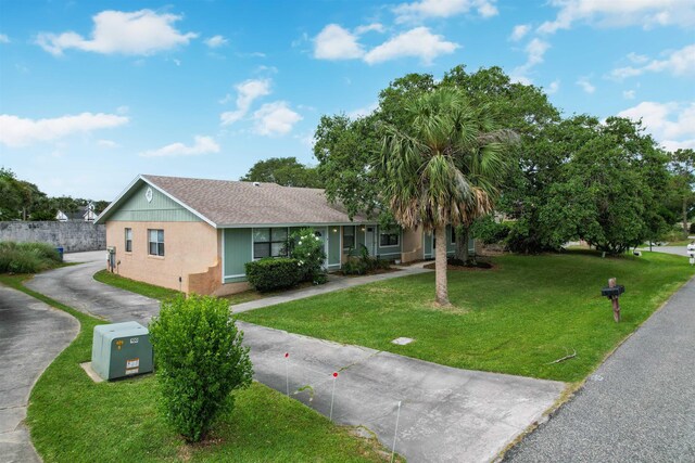 129 Rio Del Mar St Unit C, Saint Augustine, FL 32080 - single story home featuring a front yard and stucco siding
