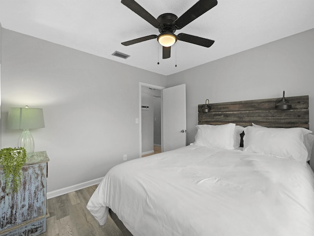 129 Rio Del Mar St Unit C, Saint Augustine, FL 32080 - bedroom featuring wood finished floors, baseboards, and ceiling fan