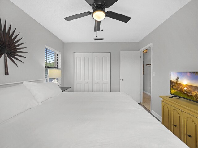 129 Rio Del Mar St Unit C, Saint Augustine, FL 32080 - bedroom with a closet, a ceiling fan, and baseboards