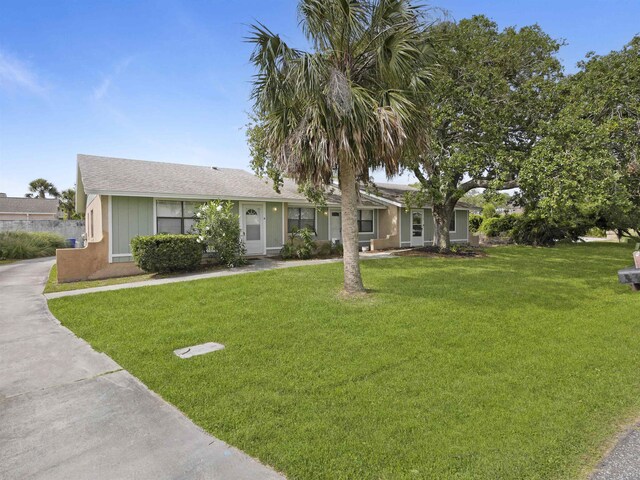 129 Rio Del Mar St Unit C, Saint Augustine, FL 32080 - ranch-style home featuring a front yard