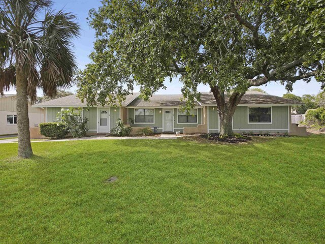 129 Rio Del Mar St Unit C, Saint Augustine, FL 32080 - single story home featuring a front yard