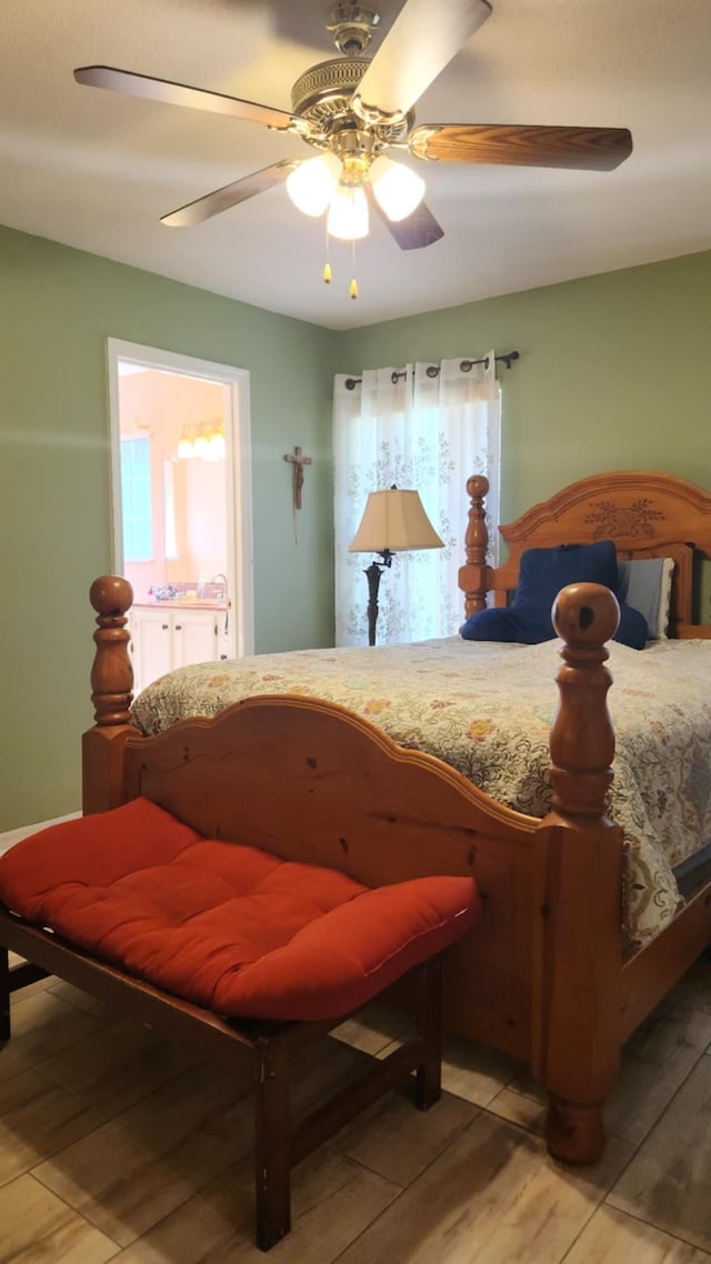 bedroom with light wood-type flooring and ceiling fan