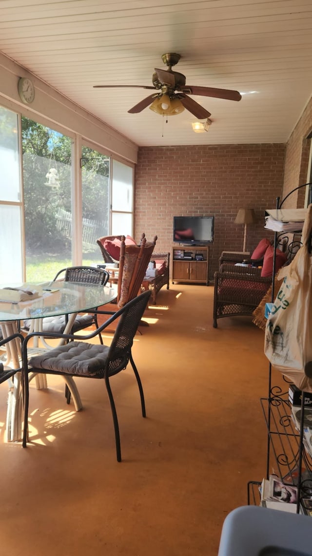 interior space with a ceiling fan