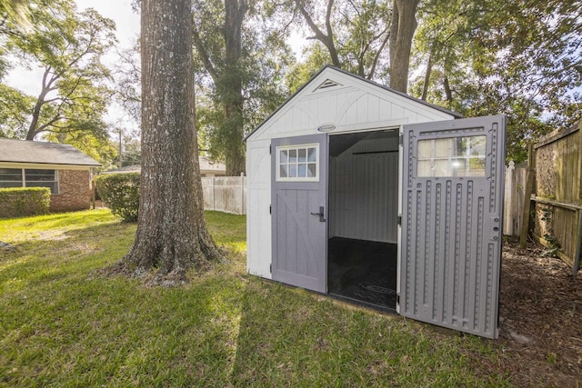 view of outdoor structure with a yard