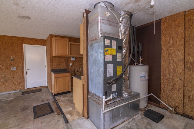 utility room featuring water heater