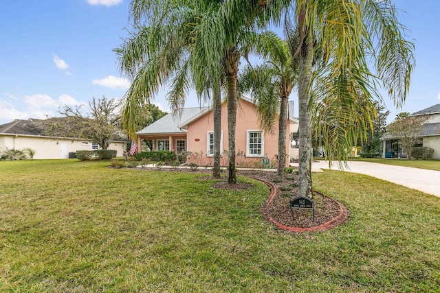 view of front facade with a front lawn