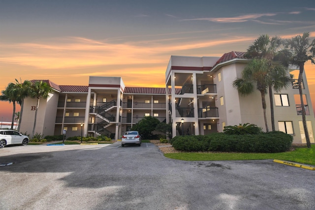 view of outdoor building at dusk