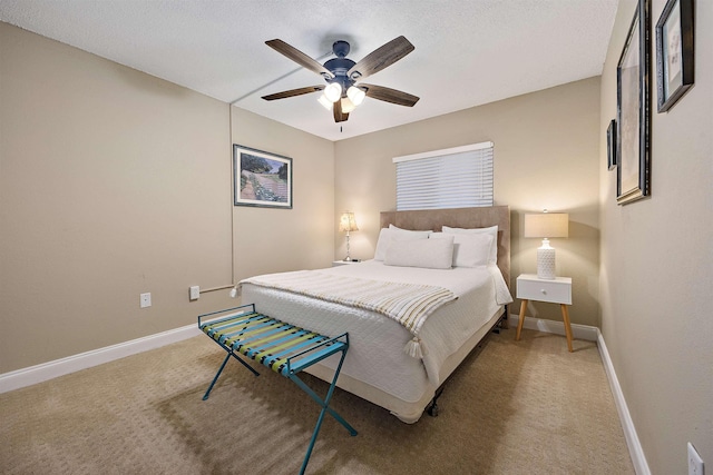 bedroom with ceiling fan and carpet floors