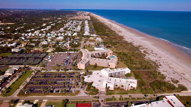 aerial view featuring a view of the beach and a water view