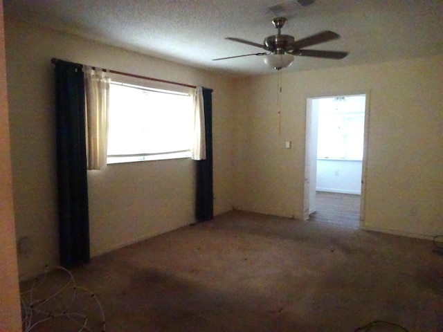 unfurnished room featuring ceiling fan