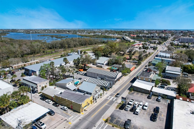 drone / aerial view with a water view