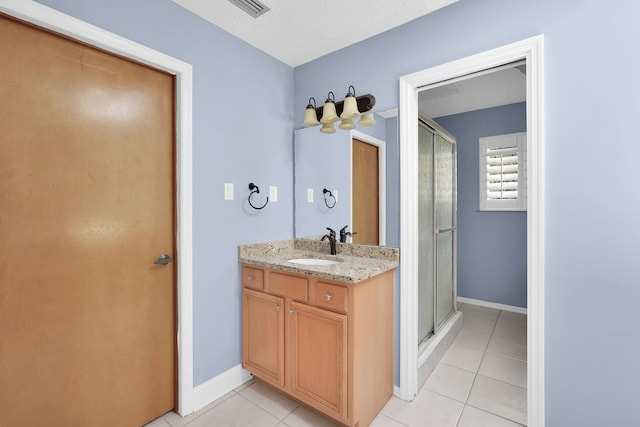 6 Versaggi Pl, Saint Augustine, FL 32080 - bathroom with vanity, tile patterned floors, and a shower stall