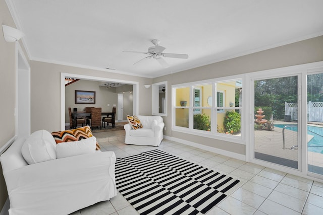 6 Versaggi Pl, Saint Augustine, FL 32080 - living room with crown molding, light tile patterned floors, a ceiling fan, and a chandelier