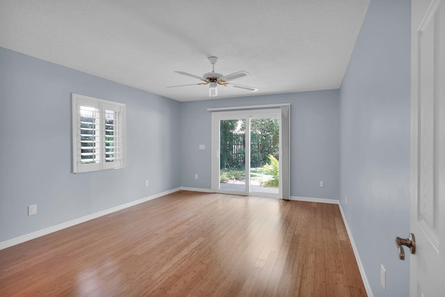 6 Versaggi Pl, Saint Augustine, FL 32080 - unfurnished room with ceiling fan, hardwood / wood-style floors, and a textured ceiling
