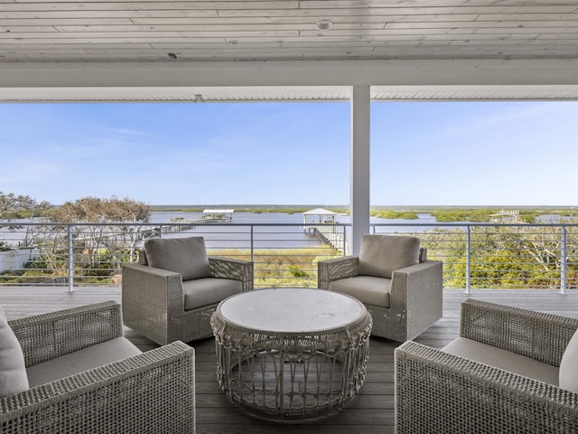 deck featuring a water view