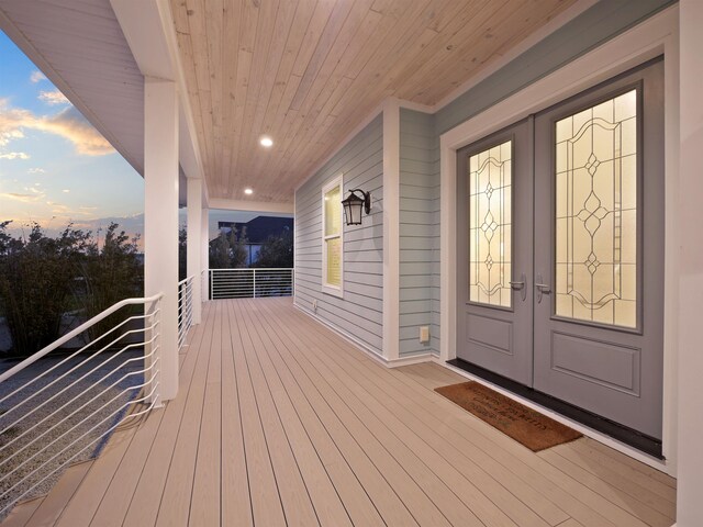 deck at dusk with french doors