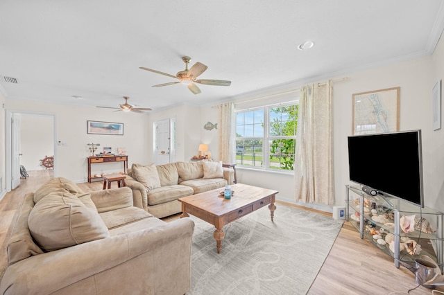 18 Ocean Ave, Saint Augustine, FL 32084 - living area featuring crown molding, ceiling fan, and light wood-style floors
