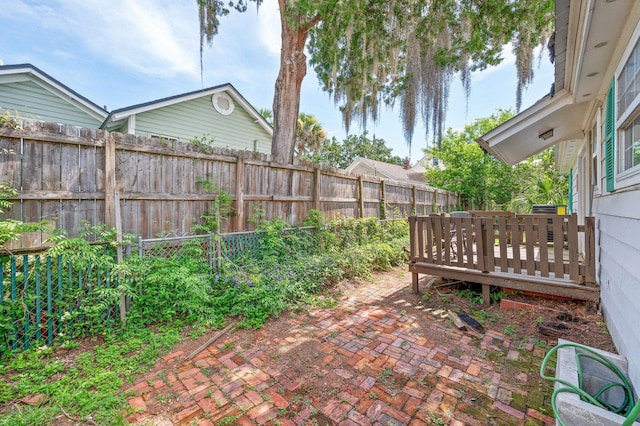 18 Ocean Ave, Saint Augustine, FL 32084 - fenced backyard with a wooden deck