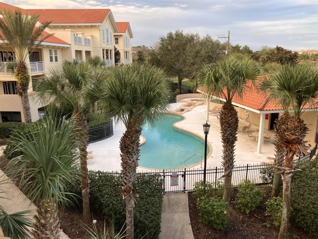 view of pool featuring a patio