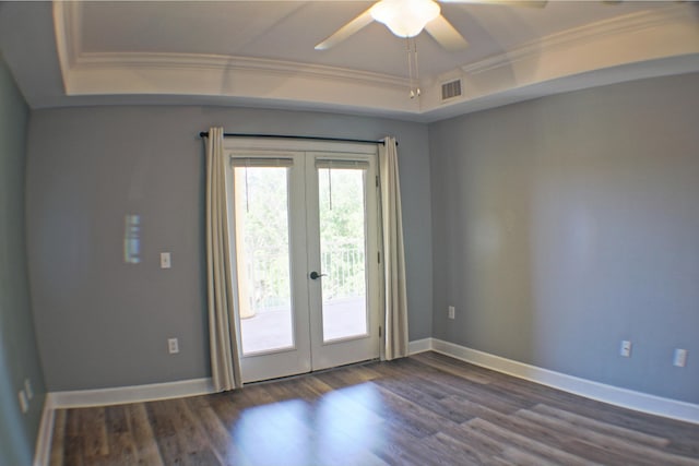 doorway featuring dark hardwood / wood-style flooring, ornamental molding, and french doors