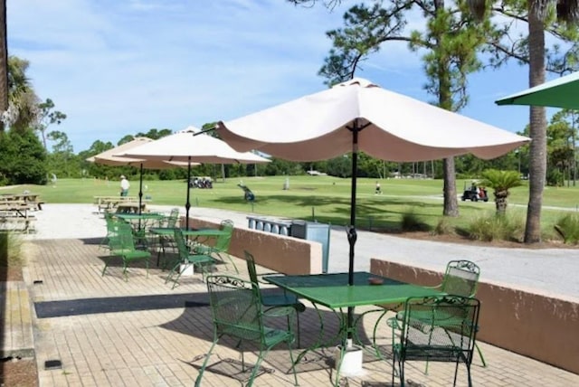 705 Augusta Cir, Saint Augustine, FL 32086 - view of patio / terrace featuring outdoor dining space