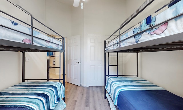 705 Augusta Cir, Saint Augustine, FL 32086 - bedroom with wood finished floors and a high ceiling