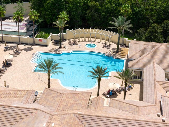 view of pool featuring a patio area