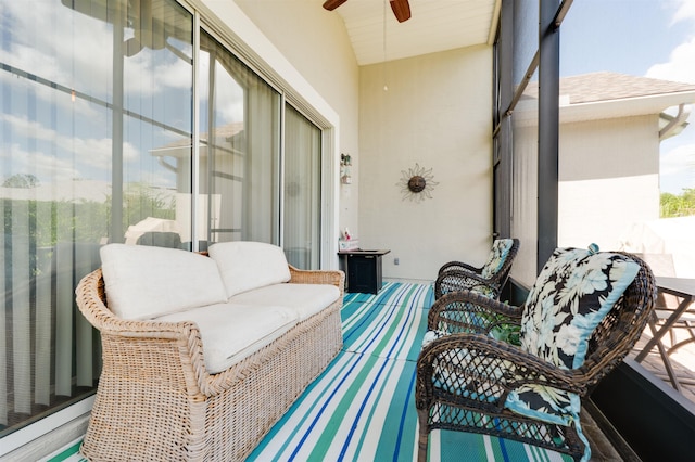 exterior space featuring plenty of natural light, lofted ceiling, and ceiling fan