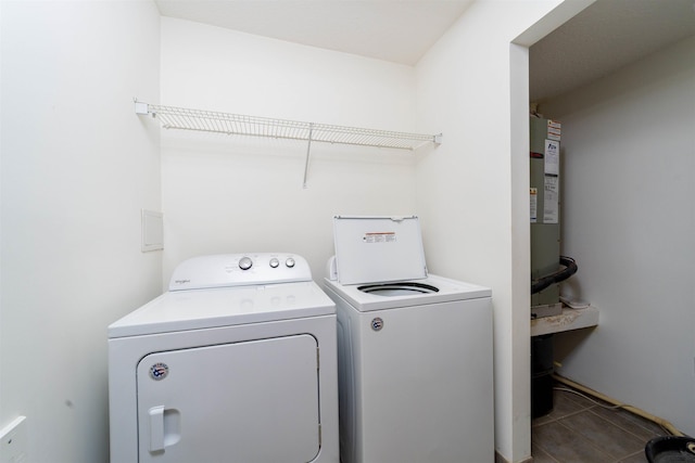 117 Laurel Wood Way Unit 105, Saint Augustine, FL 32086 - washroom with washing machine and dryer and tile patterned floors