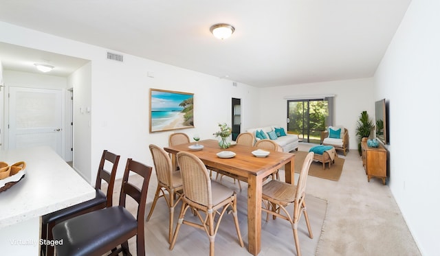 117 Laurel Wood Way Unit 105, Saint Augustine, FL 32086 - dining space featuring light colored carpet