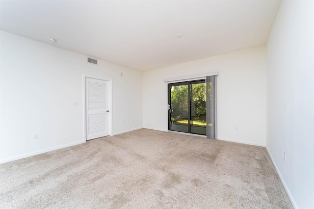 117 Laurel Wood Way Unit 105, Saint Augustine, FL 32086 - spare room with carpet flooring and baseboards