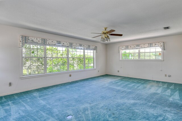 1536 San Rafael Way, Saint Augustine, FL 32080 - unfurnished room with ceiling fan, carpet flooring, baseboards, and a textured ceiling