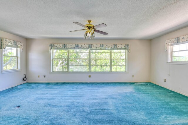 1536 San Rafael Way, Saint Augustine, FL 32080 - carpeted spare room featuring a textured ceiling, a ceiling fan, and baseboards