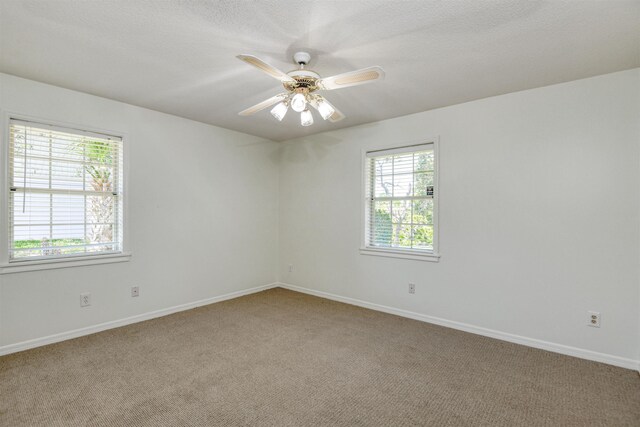 1536 San Rafael Way, Saint Augustine, FL 32080 - empty room with carpet, baseboards, ceiling fan, and a textured ceiling