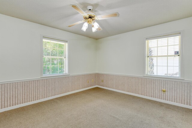 1536 San Rafael Way, Saint Augustine, FL 32080 - unfurnished room with light carpet, ceiling fan, and wainscoting