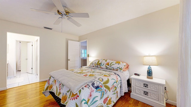 bedroom featuring ceiling fan and wood-type flooring