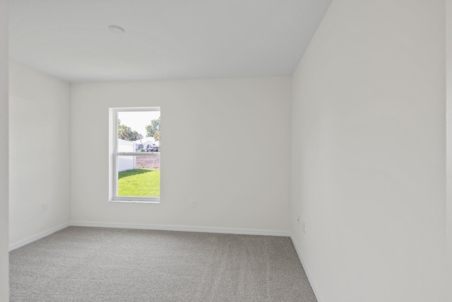 30 Palm Ln, Palm Coast, FL 32164 - carpeted empty room with baseboards