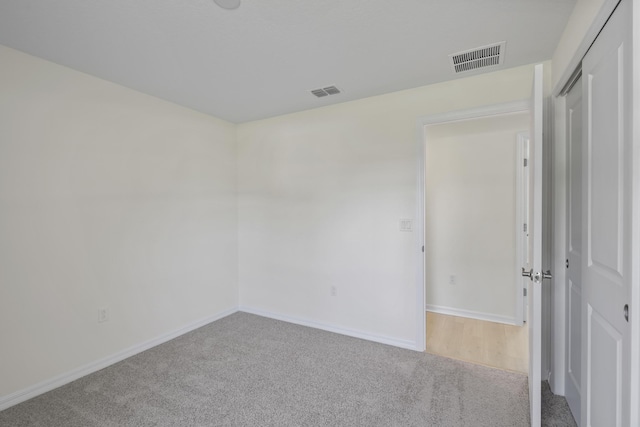 30 Palm Ln, Palm Coast, FL 32164 - empty room featuring carpet flooring and baseboards