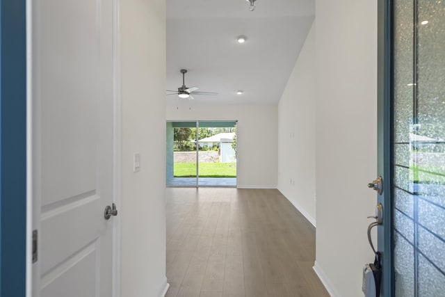 30 Palm Ln, Palm Coast, FL 32164 - hallway with baseboards and wood finished floors