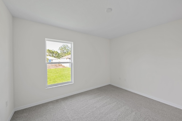 30 Palm Ln, Palm Coast, FL 32164 - carpeted spare room featuring plenty of natural light and baseboards