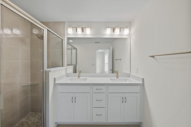 30 Palm Ln, Palm Coast, FL 32164 - bathroom featuring a stall shower and double vanity