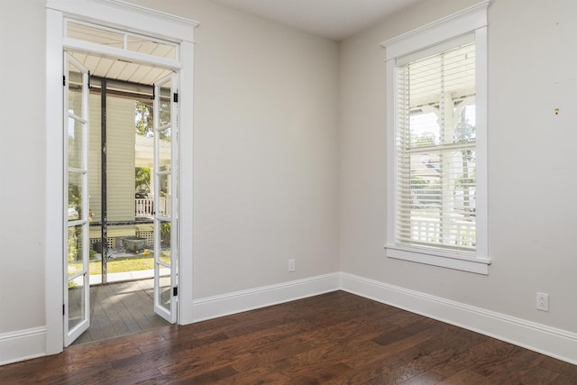 44 Carrera St, Saint Augustine, FL 32084 - unfurnished room featuring dark wood finished floors and baseboards