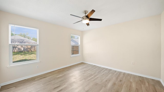 3416 6th St, Elkton, FL 32033 - empty room with light wood-style flooring and ceiling fan